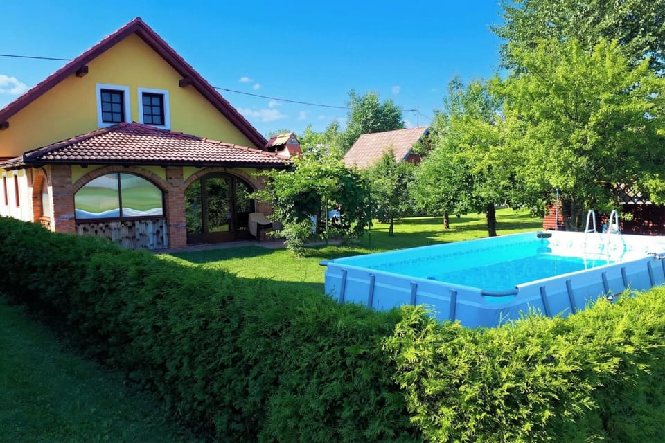Family House, 3 Bedrooms, Fireplace (Forge of Happiness Rustic Retreat) | Pool | Seasonal outdoor pool