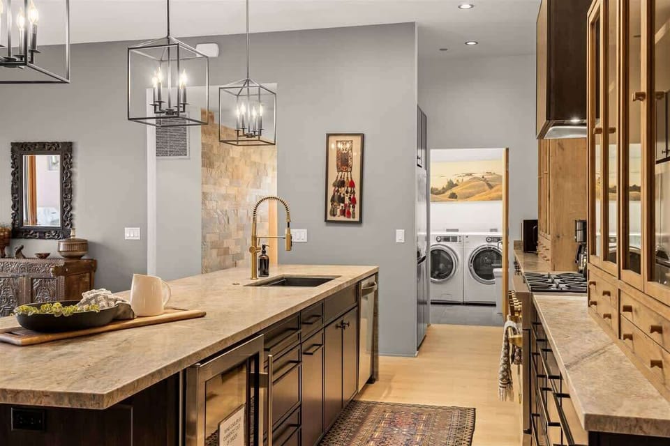 Custom kitchen with full laundry