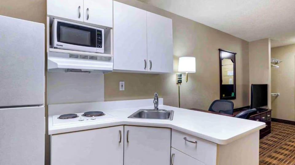 Fridge, microwave, stovetop, cookware/dishes/utensils