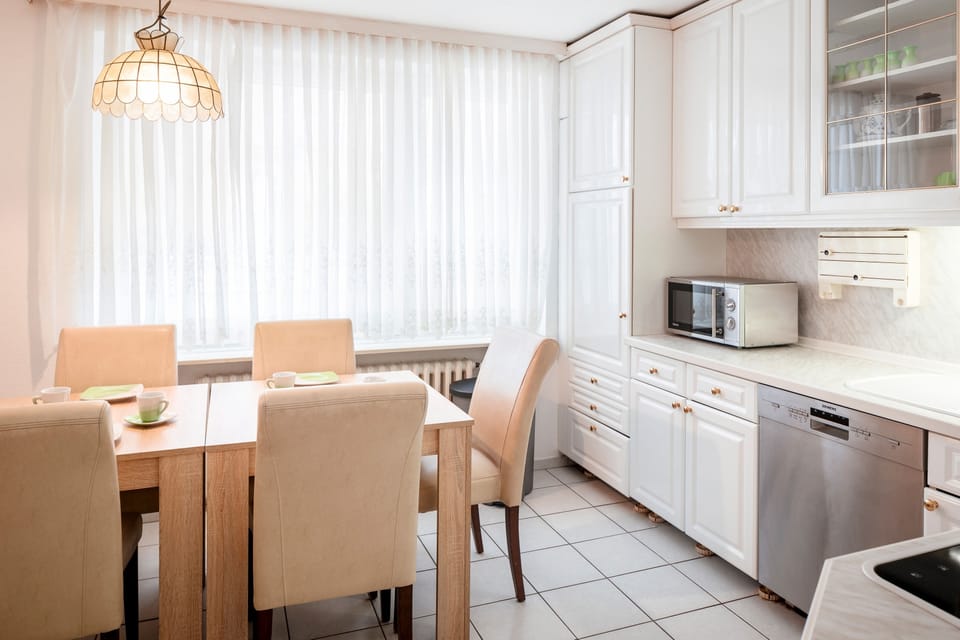 Apartment, 2 Bedrooms | Private kitchen | Fridge, stovetop, coffee/tea maker, electric kettle