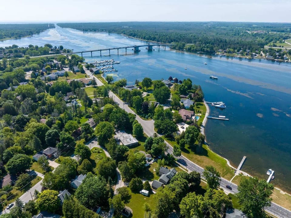 Located across the road from the Sturgeon Bay Canal.  Water views only - No water access