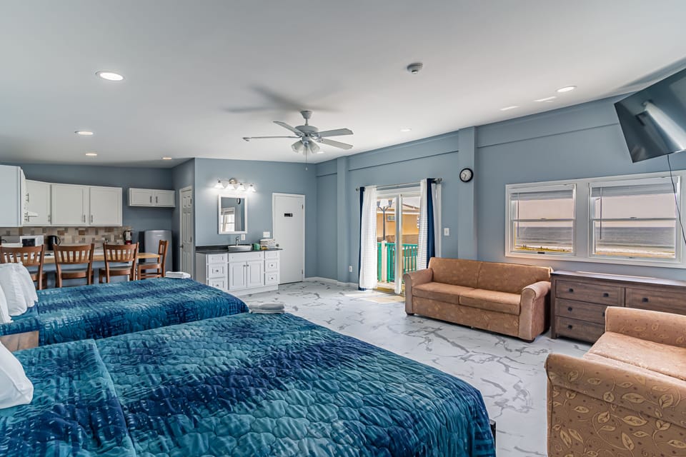 Premium Apartment, Multiple Beds, Patio, Ocean View | Living area | 32-inch TV with cable channels