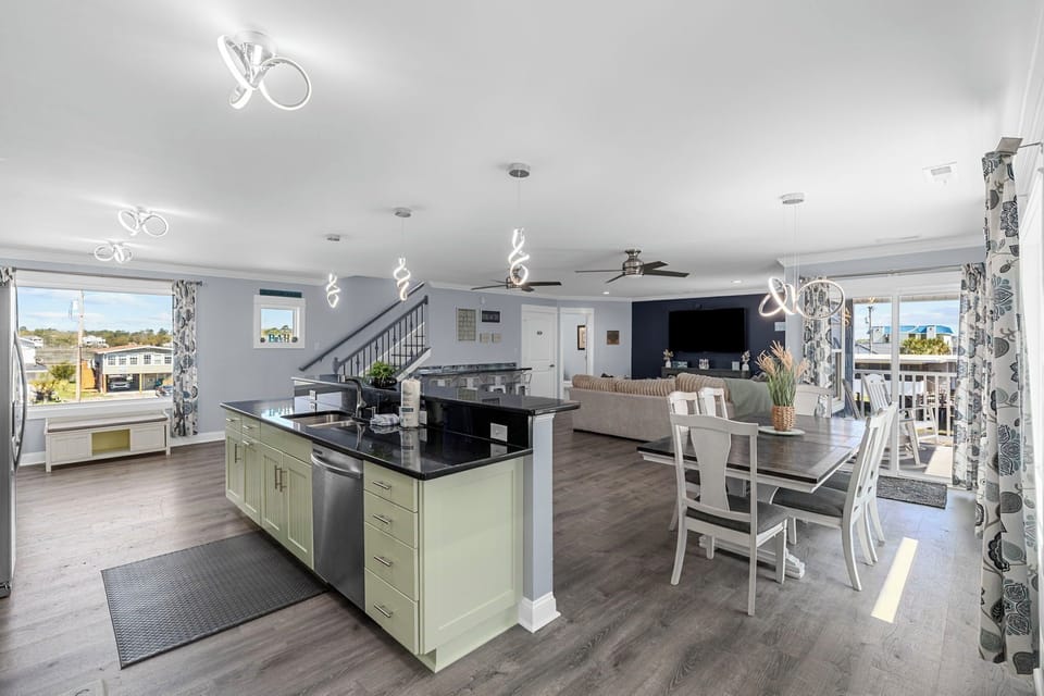 Dine in elegance in this soothing space, adorned with contemporary touches and bathed in natural light, creating a perfect blend of comfort and style.