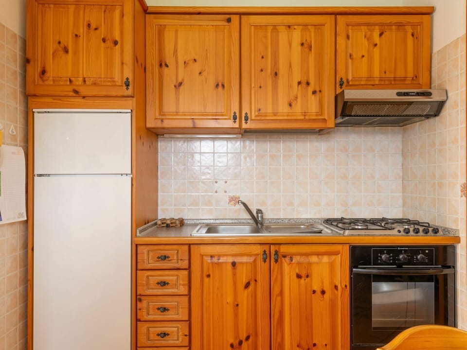 Cabinetry, Furniture, Property, Countertop, White, Kitchen, Black, Wood, Interior Design, Yellow