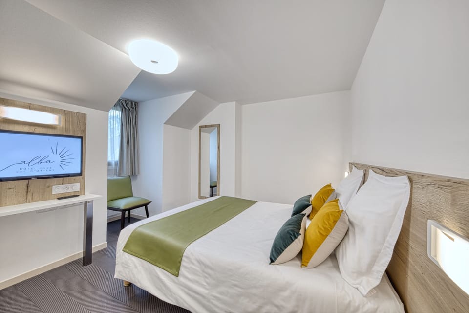 Family Room | Premium bedding, blackout drapes, soundproofing, free WiFi