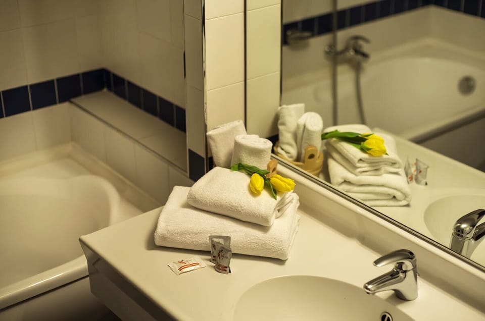 Shower, towels, soap, shampoo