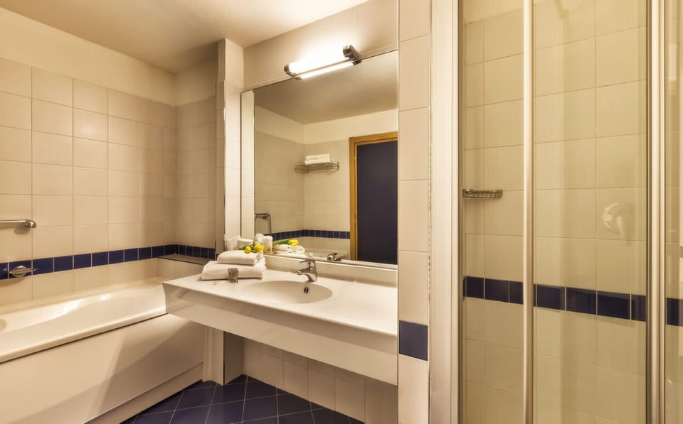 Shower, towels, soap, shampoo