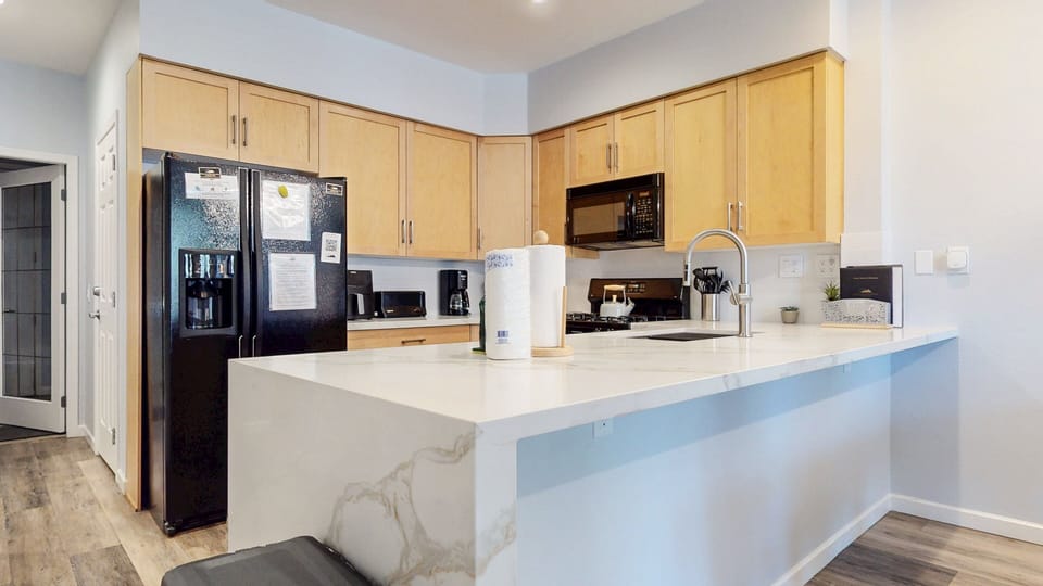 Condo, 2 Bedrooms | Private kitchen | Fridge, microwave, oven, dishwasher