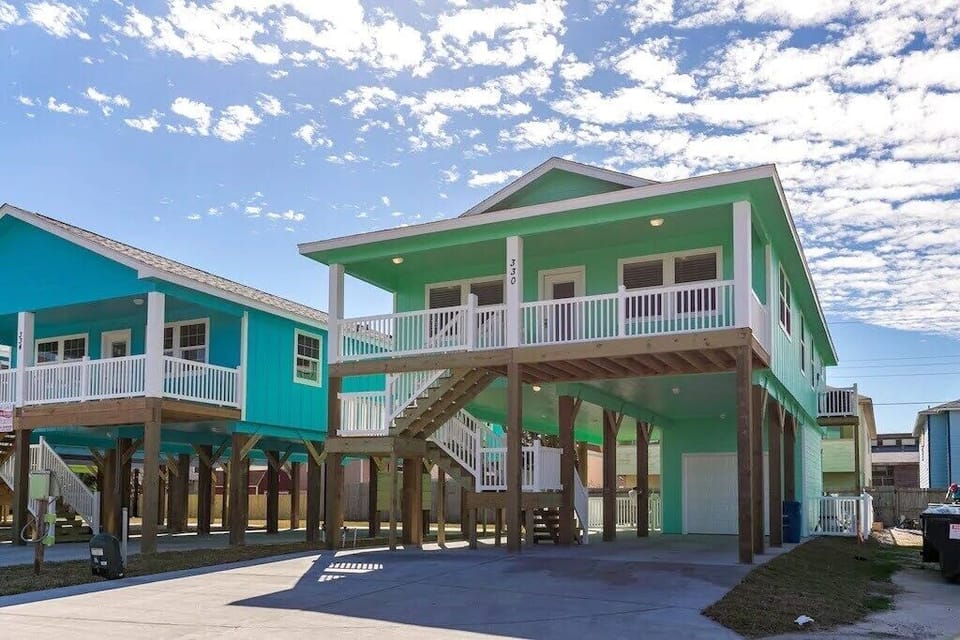 Traditional stilt beach home with front porch to enjoy coffee and watch the sun rise.