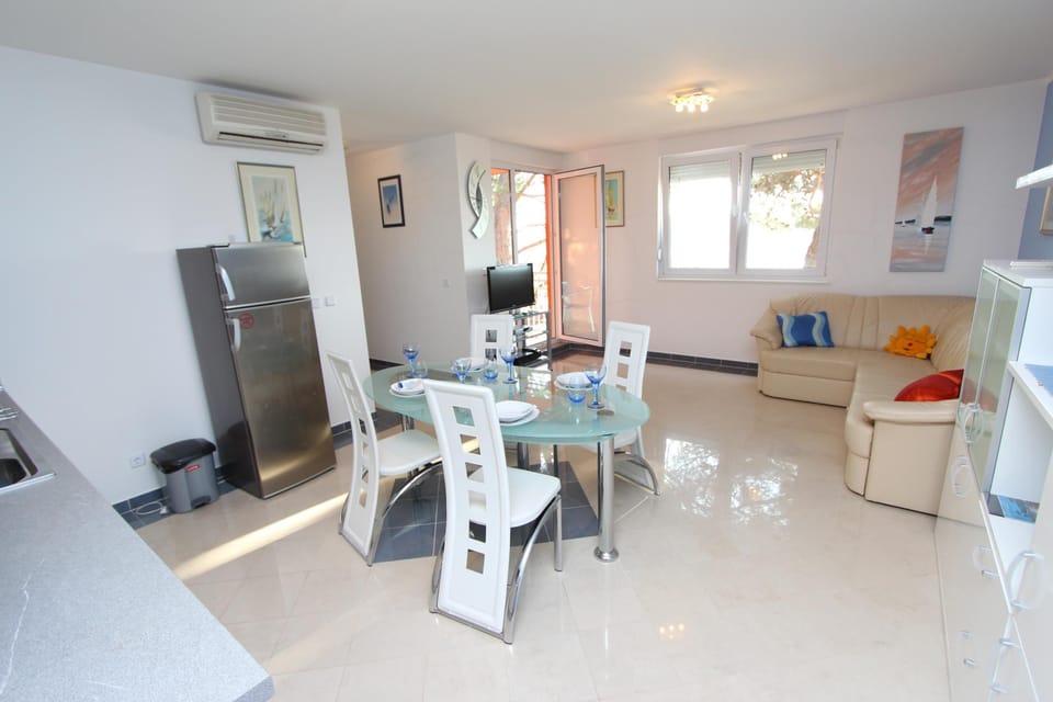 Apartment, 2 Bedrooms, Non Smoking, Balcony | Living area | 40-inch flat-screen TV with satellite channels, TV, DVD player