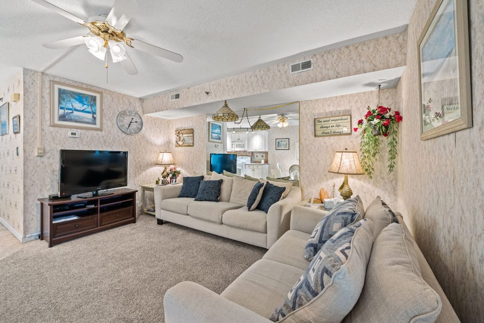 Gather the family for a movie night in the comfy living room.