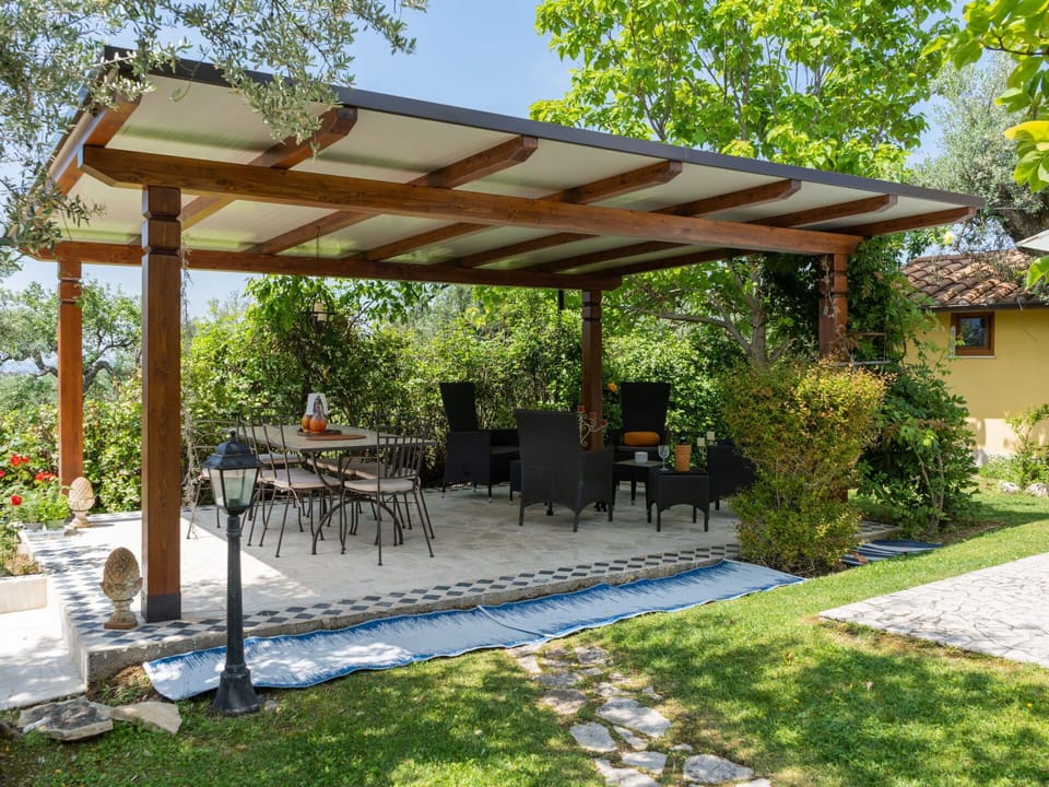 Plant, Property, Furniture, Shade, Tree, Sky, Outdoor Table, Outdoor Furniture, Architecture, Leisure