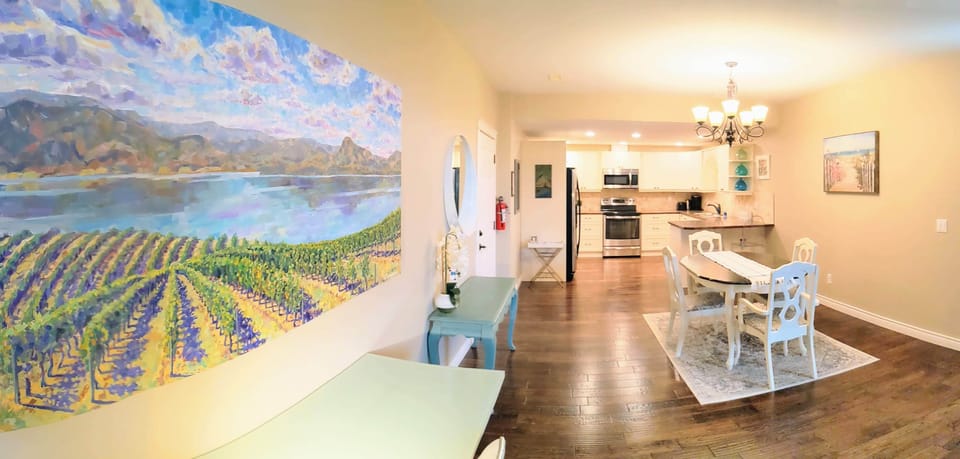 Full-size dining table with extra leaf and enough chairs to sit 6-8 comfortably