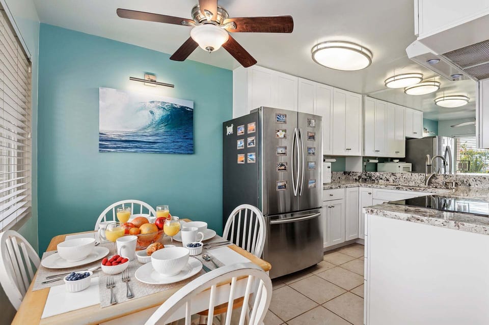 The kitchen and dining area open up to the living room.