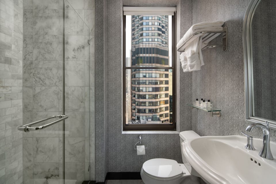 One Bedroom Suite  | Bathroom | Free toiletries, hair dryer, bathrobes, towels