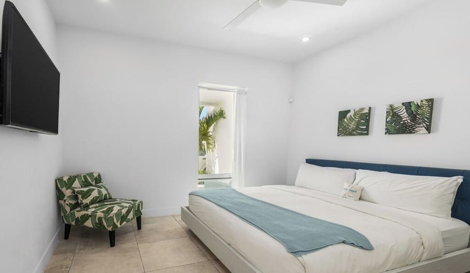Guest House King Bedroom with an amazing exterior and contemporary artwork