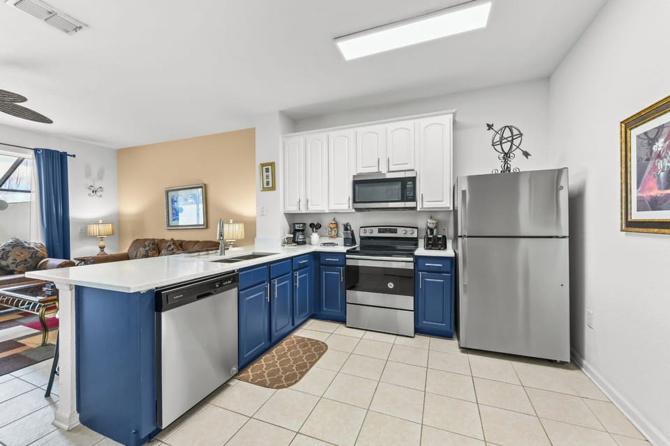 KITCHEN:  Fully equipped kitchen with modern appliances, ready for your culinary adventures.
