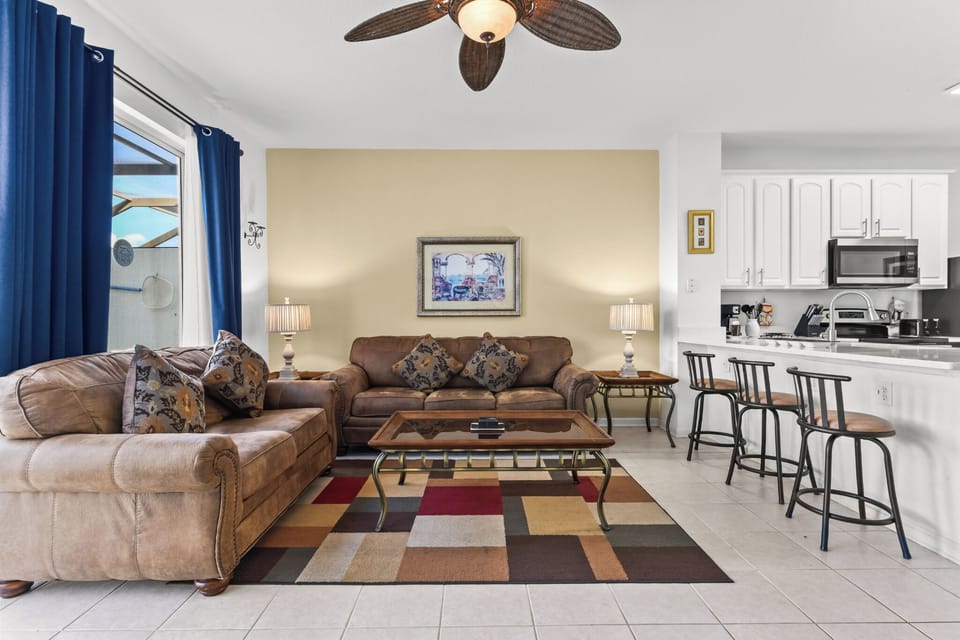 LIVING:  Bright and cozy living area with natural light and comfortable seating for your enjoyment.