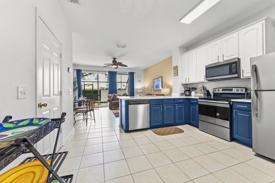 KITCHEN:  Fully Equipped Kitchen with Stainless Steel Refrigerator & Freezer, Microwave, Stove and Dishwasher.