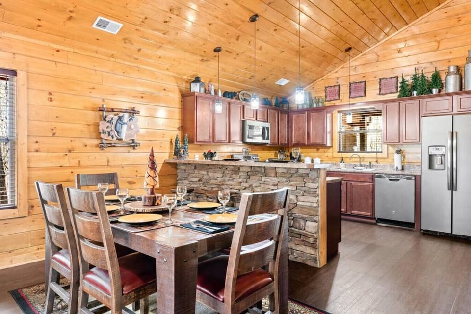 Dining Room sits 6+ at the table and 3+ at the kitchen bar. 