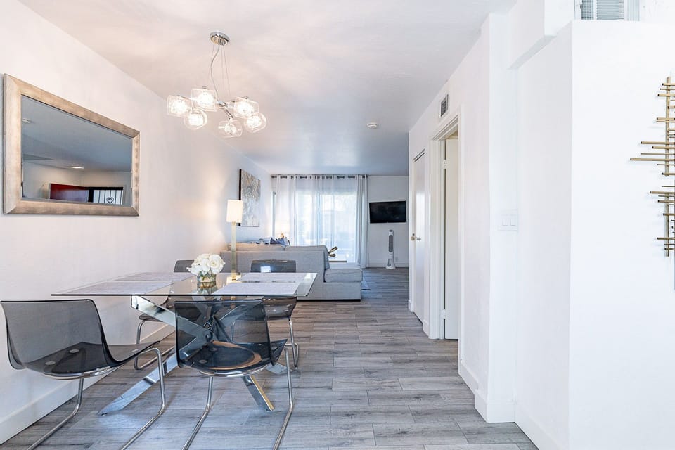 Dining room leads into the living room , bathroom is on the left