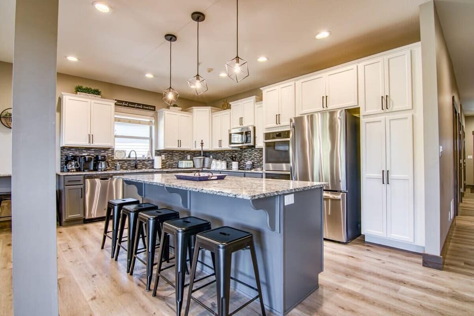 Sit on the stools at the kitchen island and chat with the chef!