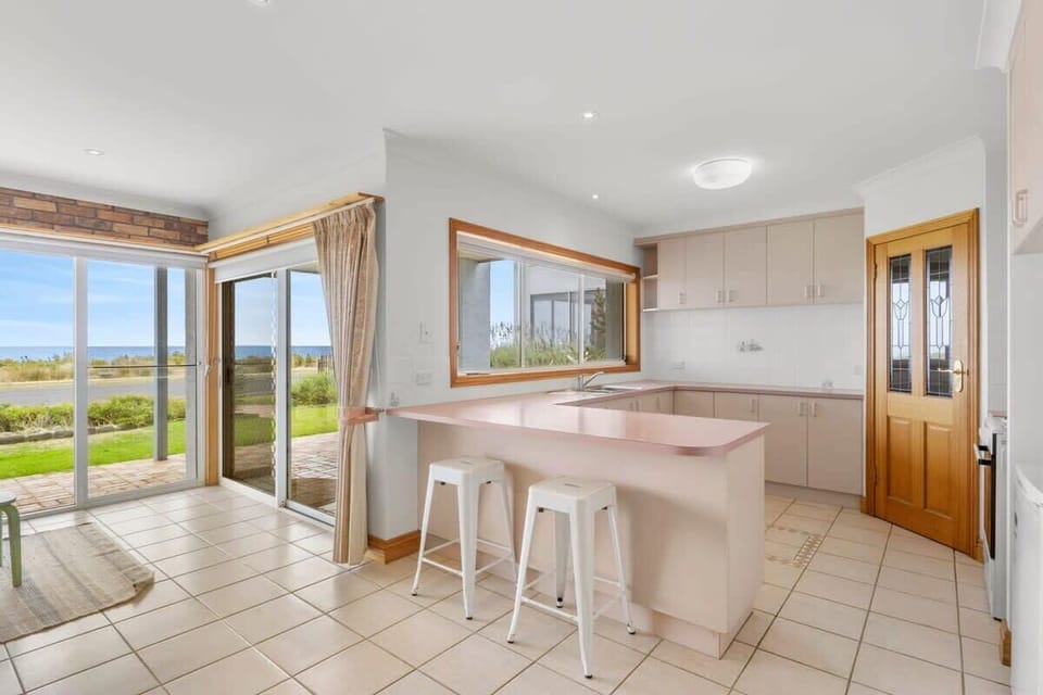 The ground floor kitchen is only equipped with bare essentials. Upstairs, the kitchen houses everything you'll need