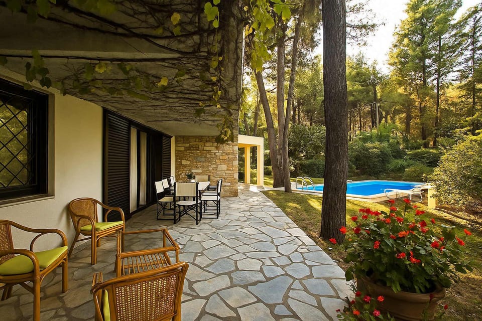 Shaded Exterior Sitting Area
Relax outdoors with natural shade and comfortable seating, ideal for morning coffee or evening drinks.