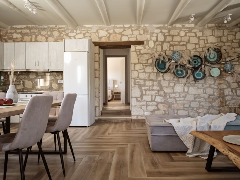 The living room features & 55' smart TV & a fully equiped kitchen.