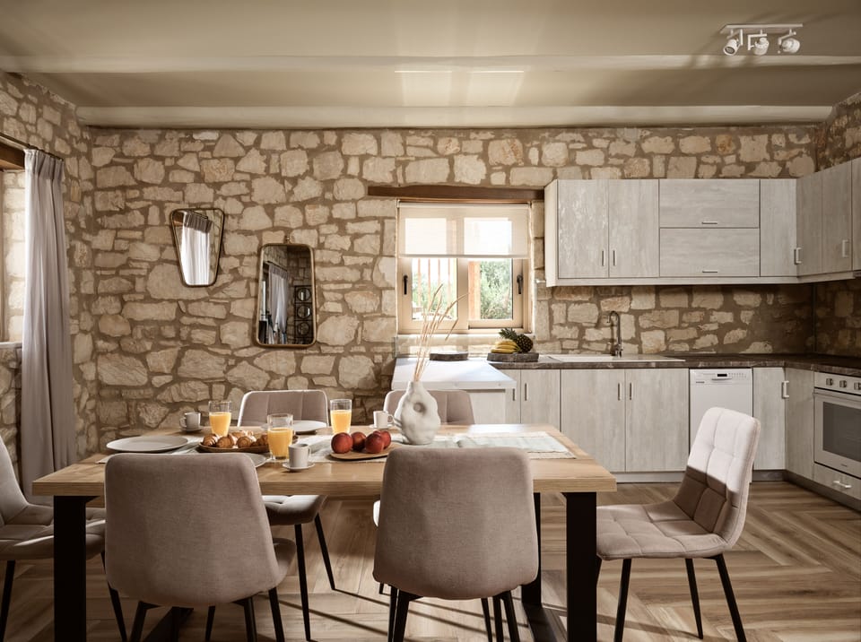 The kitchen flaunt stylish crockery & a dinning spot to long for.