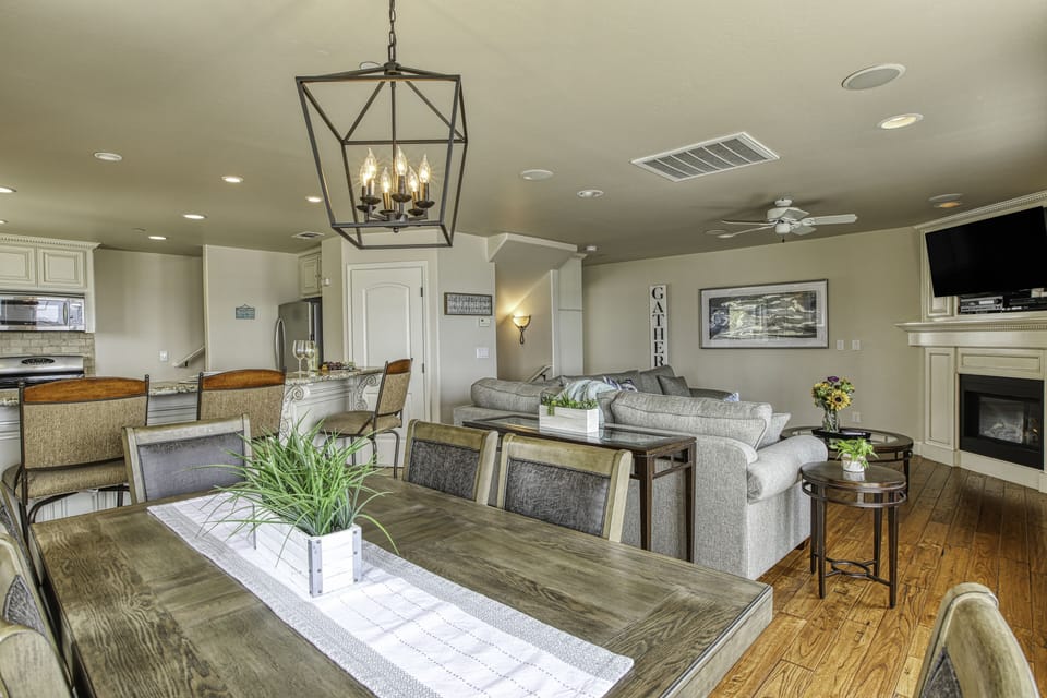 Over view of the top floor that has the kitchen, dining room and living room.