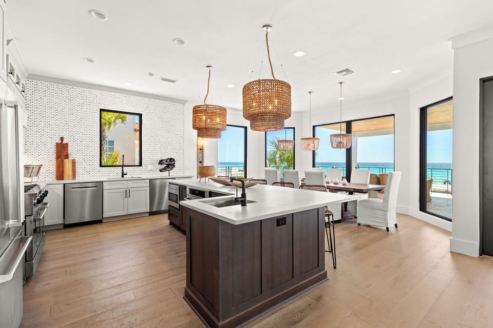 Coastal elegance at its finest—cook, dine, and unwind with stunning Gulf views right from your kitchen.