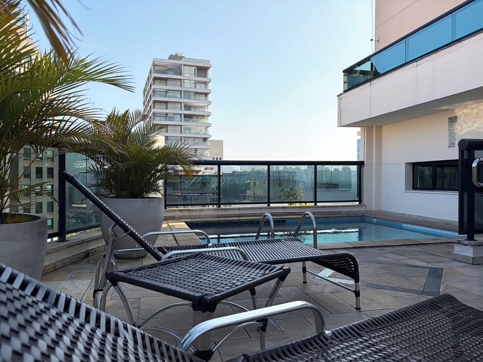 Outdoor pool, open 8:00 AM to 10:00 PM, sun loungers