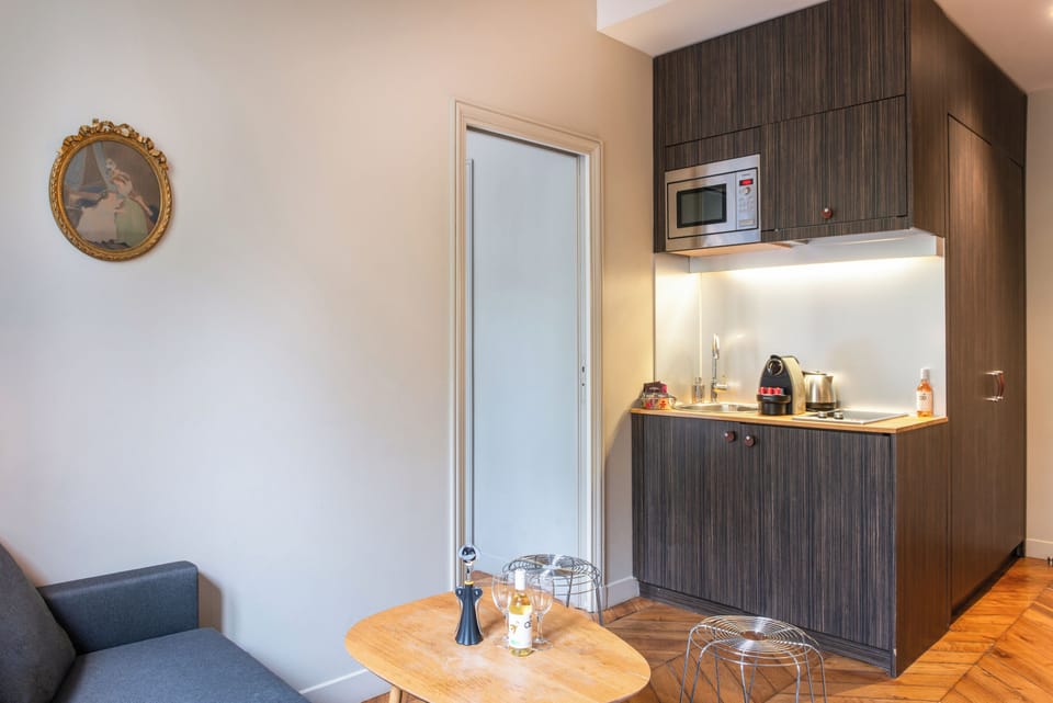 2 bedroom suite | Private kitchen | Cookware/dishes/utensils, eco-friendly cleaning products, paper towels