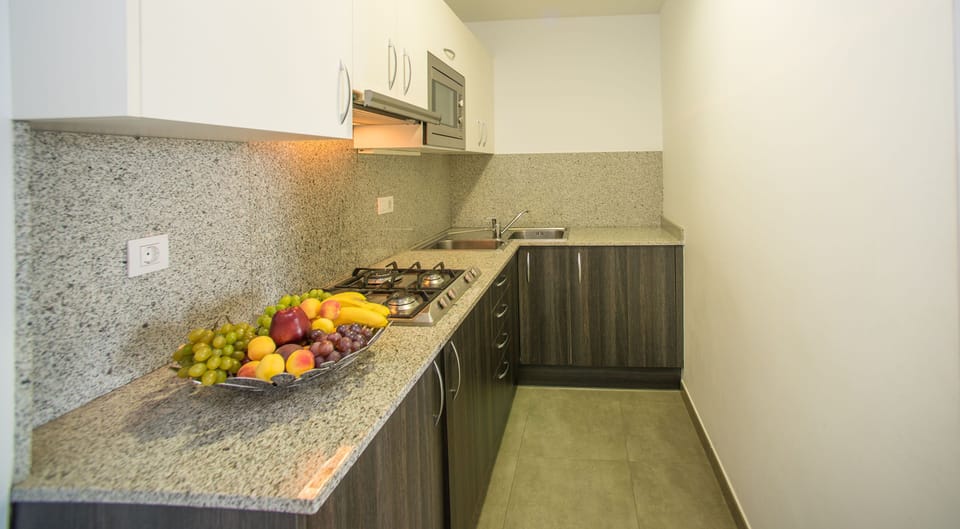 Standard Apartment, 1 Bedroom (4 pax) | Private kitchen | Fridge, microwave, stovetop, electric kettle