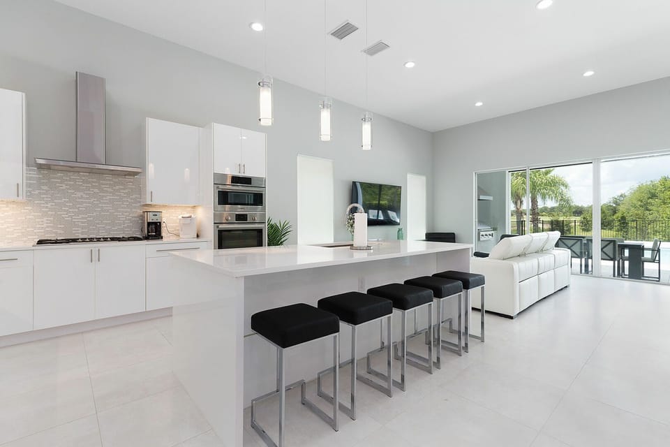 Modern kitchen and open living and dining with a view!