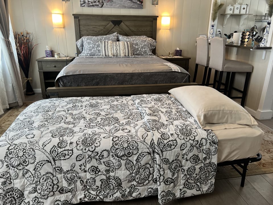 We’d be happy to set up portable bed for you Just let us know before you arrive.