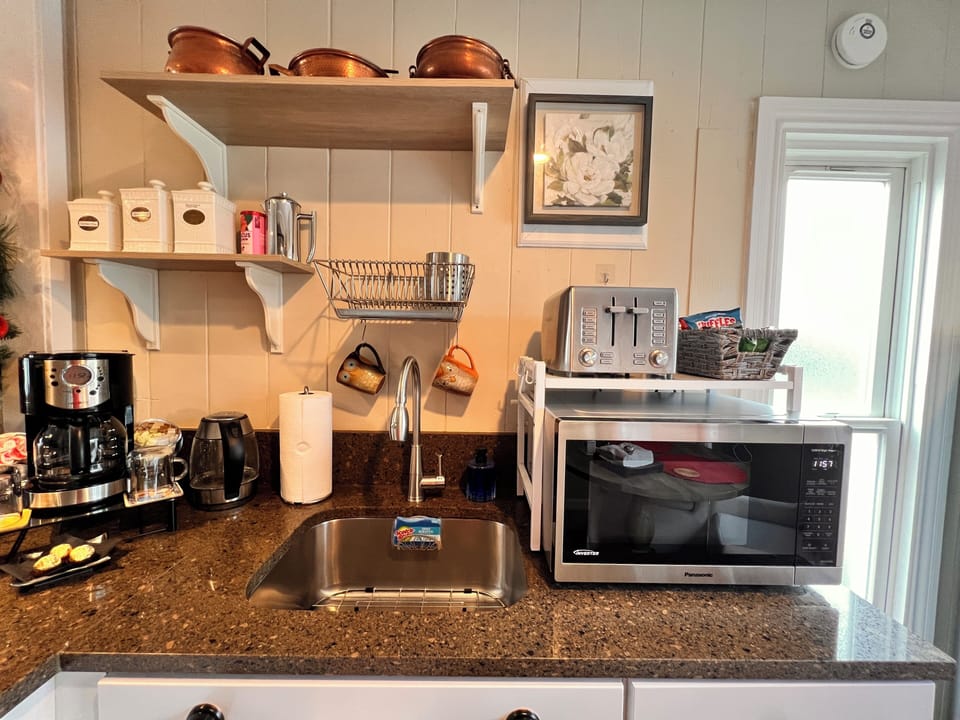 Microwave. Toaster and coffee machine.