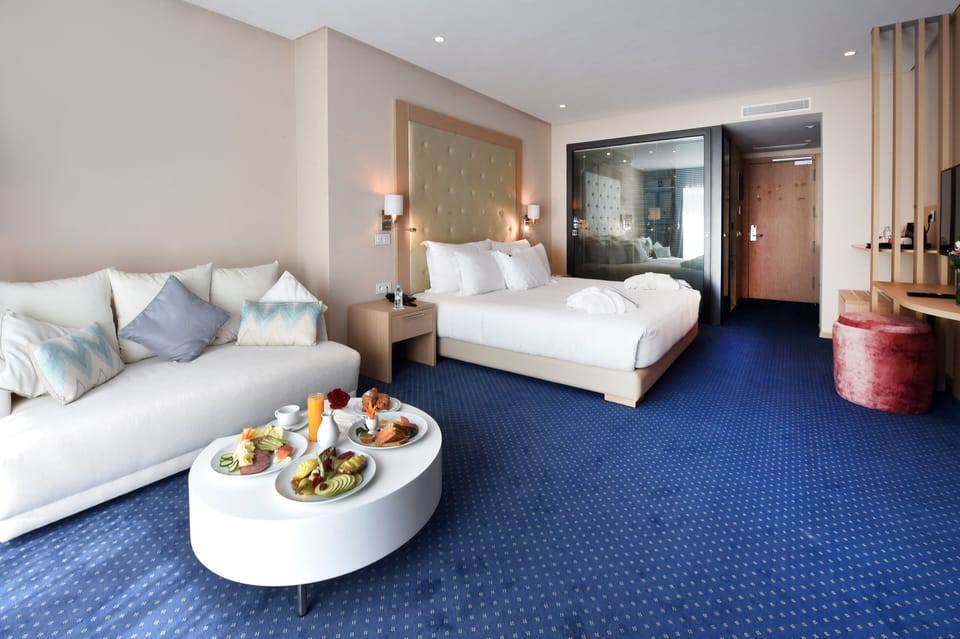 Exclusive Double Room, Private Bathroom | Minibar, in-room safe, desk, laptop workspace