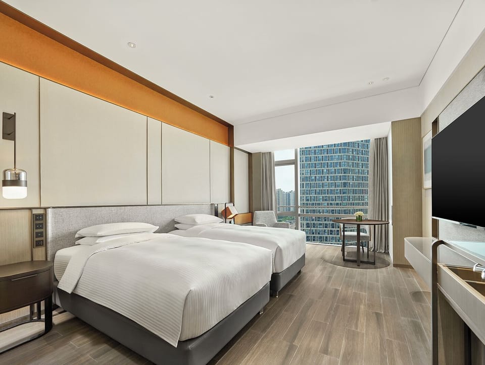 Hypo-allergenic bedding, minibar, in-room safe, desk