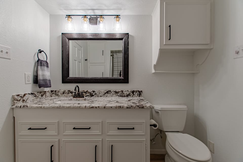 1.  Primary Bathroom with tub and shower.