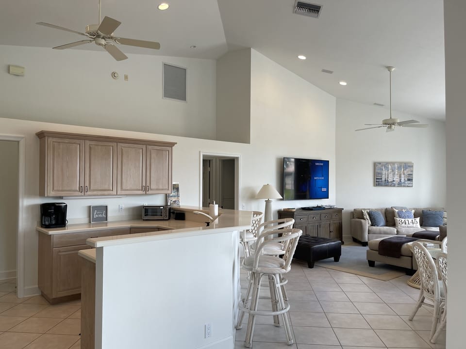Great room - open concept with soaring ceilings