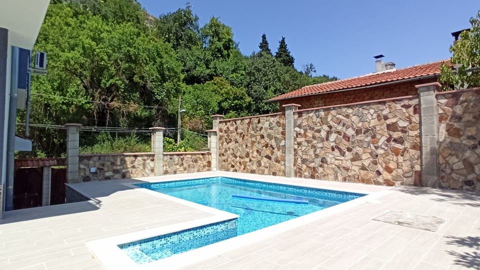 The swimming pool with normal stairs for easy access.