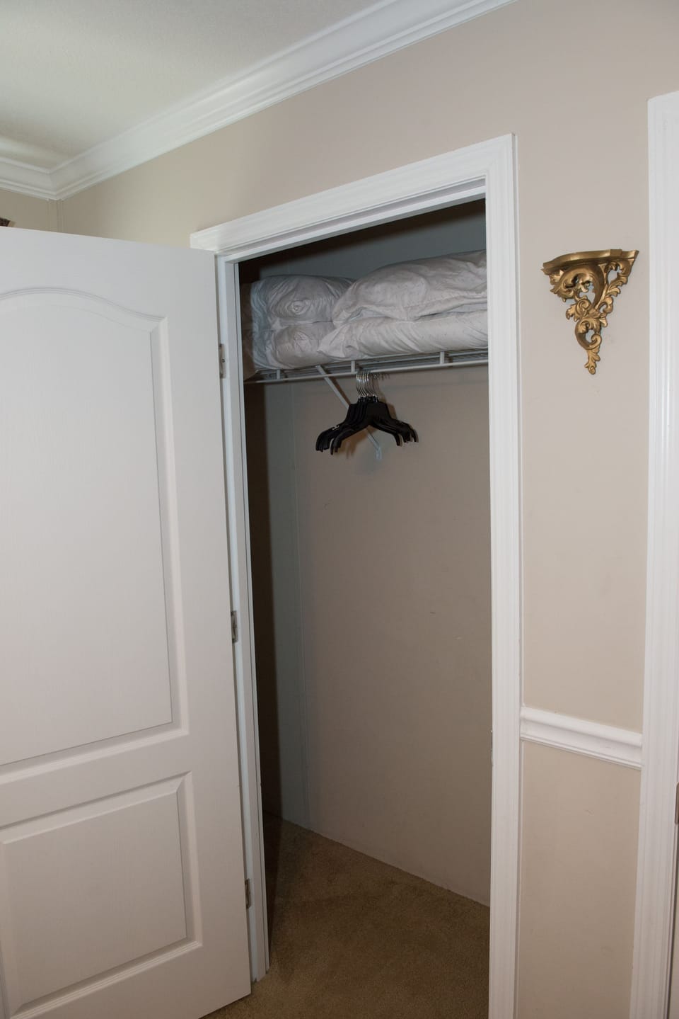Extra Pillows and hangers in Master Closet