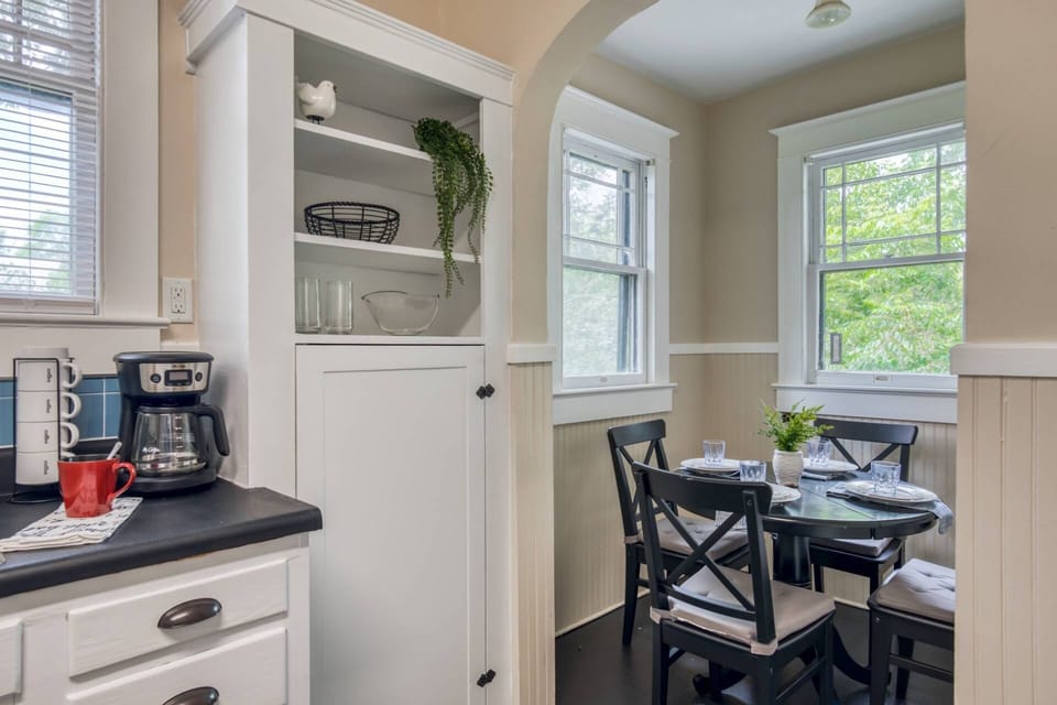 Enjoy breakfast in this cozy vintage kitchen.