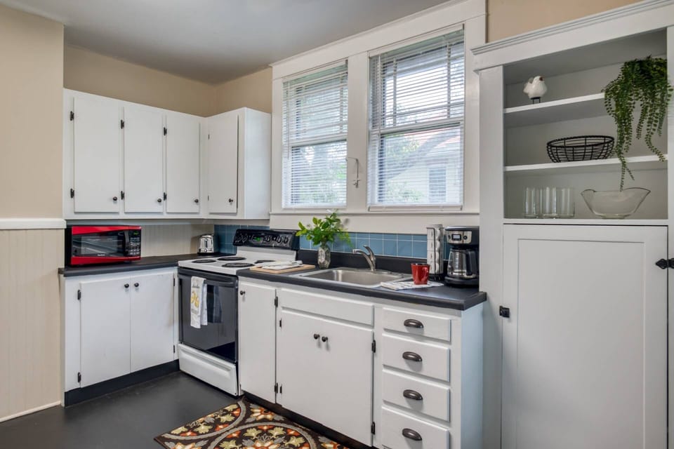 Cook up your favorites in this stocked kitchen.