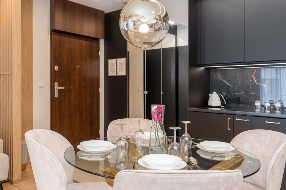 Exclusive Apartment | Living area | Flat-screen TV