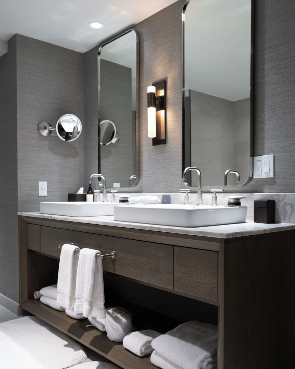 Designer toiletries, hair dryer, bathrobes, towels