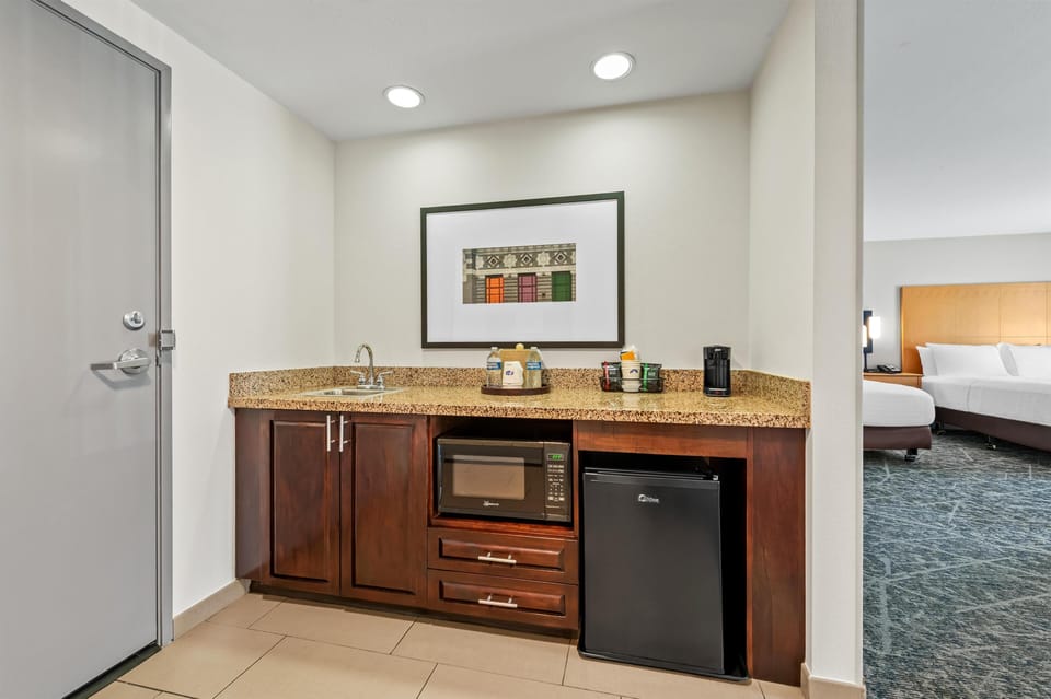 Suite, 2 Queen Beds, Non Smoking | Private kitchen | Fridge, microwave