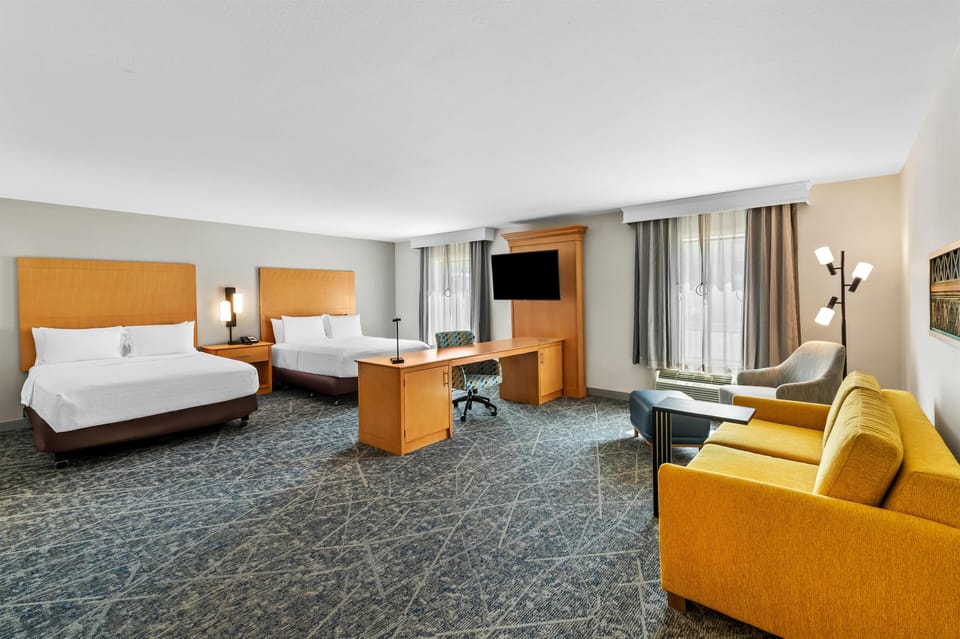 Suite, 2 Queen Beds, Non Smoking | Premium bedding, free cribs/infant beds, rollaway beds, free WiFi